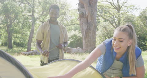 Diverse Couple Enjoying Camping Experience in Forest