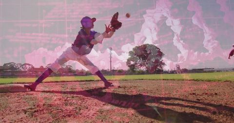 Baseball Player Lunging for Ground Ball on Sunny Field