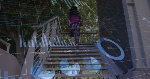 Financial analytics overlay on woman climbing stairs