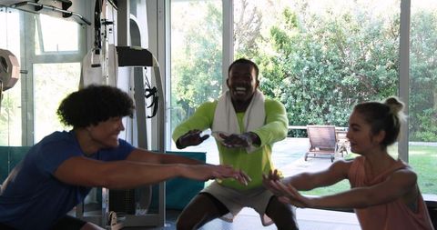 Group Exercise in Home Gym with Friends Having Fun