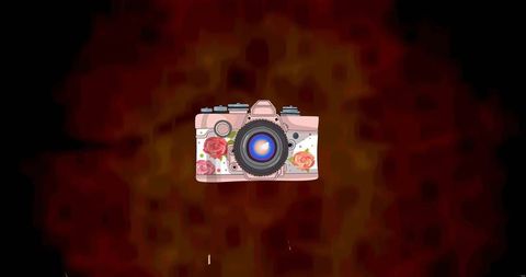 Vintage camera with rouge glow design celebrating with falling confetti