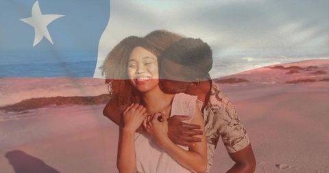 Romantic Embrace on Seaside at Sunrise with National Flag Overlay