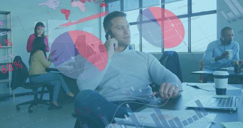 Businessman Analyzing Data with Overlaid Charts in Office