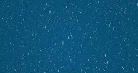 White particles falling against blue background