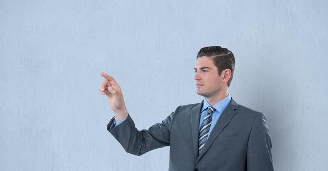 Digital composite of Confident businessman gesturing over blue background