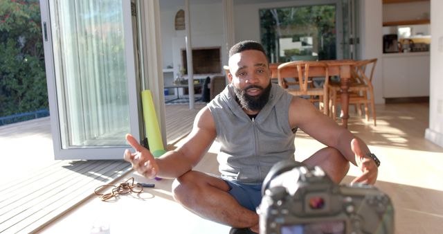 Black Man Giving Fitness Lesson at Home with Camera - Download Free Stock Images Pikwizard.com