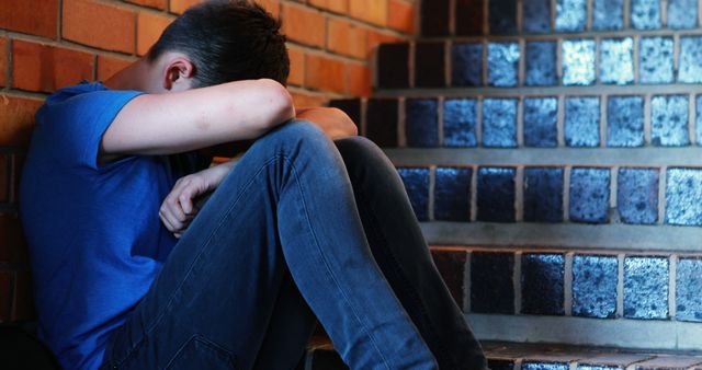 Teenager Sitting on Stairs Feeling Upset - Download Free Stock Images Pikwizard.com