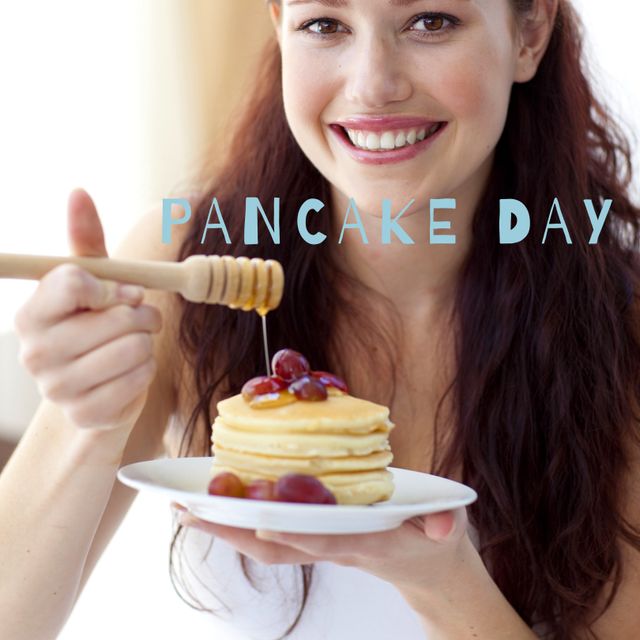 Woman Enjoying Pancakes with Honey and Grapes for Breakfast - Download Free Stock Templates Pikwizard.com