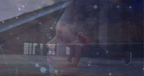 Man Performing Push-Up with Digital Network Overlay