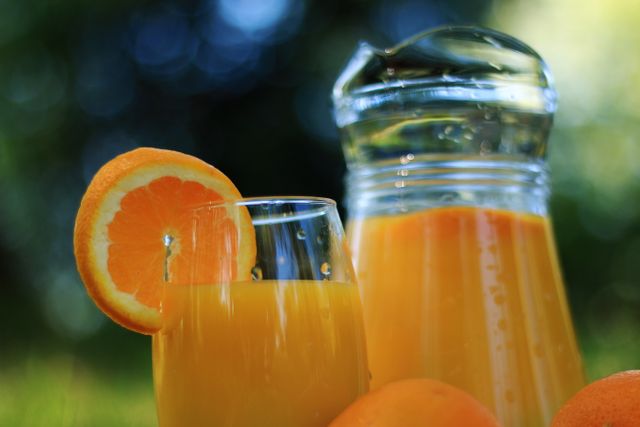 Refreshing Orange Juice in Glass and Jug with Fresh Oranges Outdoors - Download Free Stock Photos Pikwizard.com