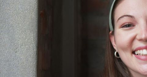 Smiling Young Professional Leaning Against Wall - Download Free Stock Images Pikwizard.com