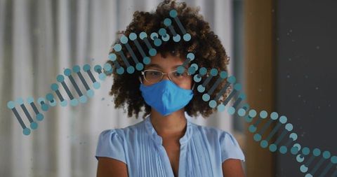 Woman wearing blue mask and glasses with dna double helix overlay representing genomics