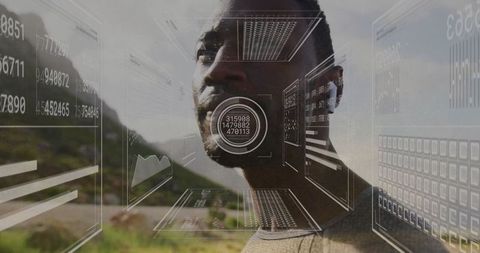 Man viewing augmented reality data in mountain valley