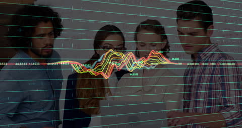 Team Analyzing Data Graphics in Modern Office
