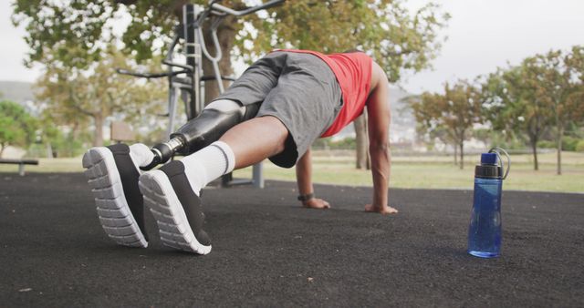 Man with Prosthetic Leg Exercising Outdoors - Fitness and Strength Training - Download Free Stock Images Pikwizard.com