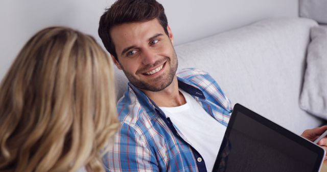 Couple Relaxing on Sofa with Laptop - Download Free Stock Images Pikwizard.com