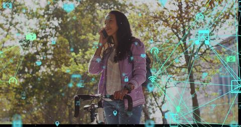 Woman Engaging with Digital Connections While Walking Bike