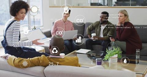 Diverse team discussing co2 overlays and sustainability analytics in modern office lounge