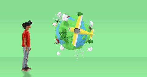 Young boy exploring 3d virtual world with vr headset