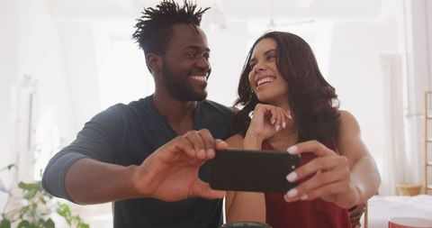 Couple Taking Selfie at Home Relaxing on Weekend