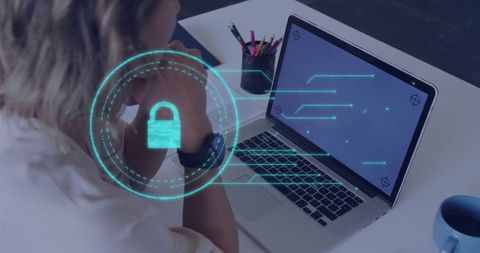 Professional Woman Analyzing Cybersecurity on Laptop in Office