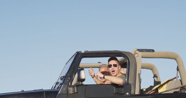 Friends Enjoying Road Trip in Convertible Jeep - Download Free Stock Images Pikwizard.com