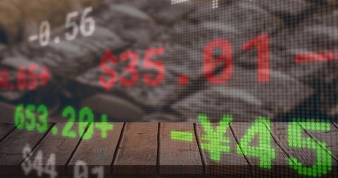 Displaying led stock ticker overlay on rustic wooden tabletop with dollar and yen numerals