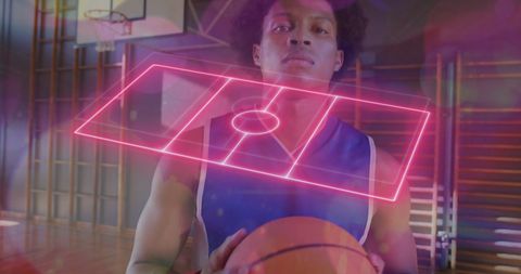 Basketball Player Holding Ball in Gym with Futuristic Overlay