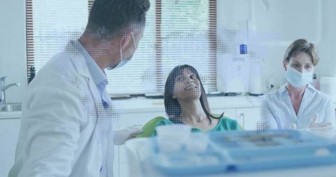 Dentist Discussing Dental Procedure with Patient in Clinic