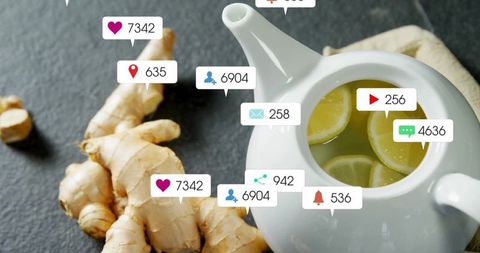 Brewing Herbal Tea in Teapot with Ginger and Social Media Concepts