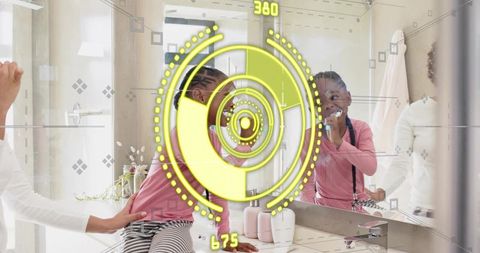 Child brushing teeth at vanity mirror with guardian steadying and smart mirror hud