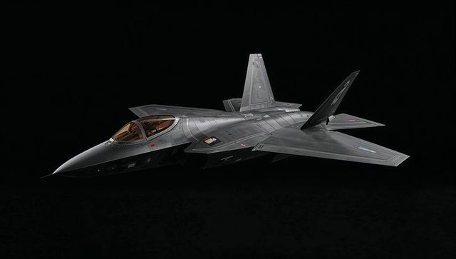 Stealth fighter jet display on black background
