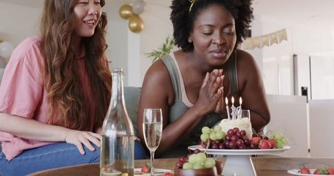 Interracial Lesbian Couple Celebrating Birthday at Home