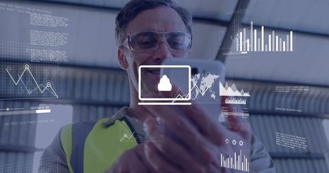 Industrial technician viewing augmented reality dashboards on smartphone in warehouse