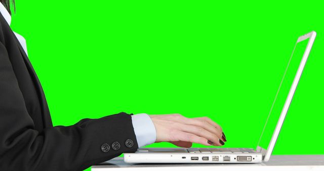 Businesswoman Working on Laptop with Green Screen Background - Download Free Stock Images Pikwizard.com