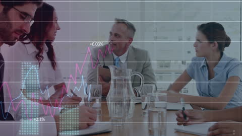 Business Team Analyzing Financial Data Trends in a Meeting