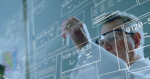 Innovative Scientist Analyzing Digital Data Interfaces