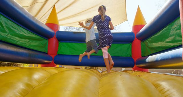 Children Jumping on Inflatable Bounce House at Playdate - Download Free Stock Images Pikwizard.com