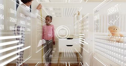 Measuring child height in nursery with augmented reality HUD and growth data overlay