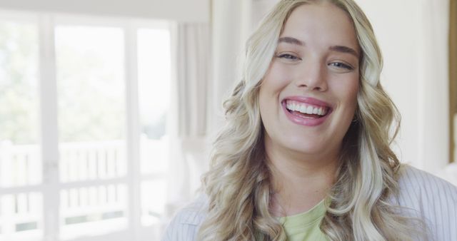 Blonde Woman Smiling Brightly in Well-lit Room - Download Free Stock Images Pikwizard.com