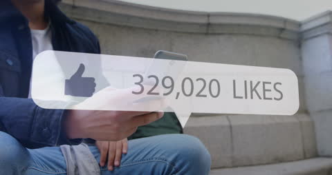 Man Viewing Phone Outdoor with Virtual Likes Displayed