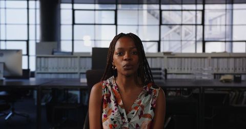 Engaged Professional Woman in Modern Office Setting