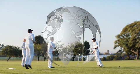 Cricketers practicing on suburban green with semi-transparent world globe overlay