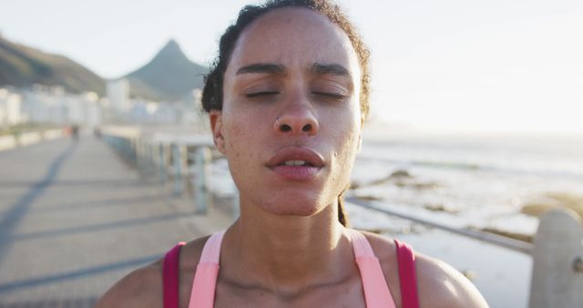 Fit African American Woman Taking a Break After Running by the Ocean - Download Free Stock Images Pikwizard.com