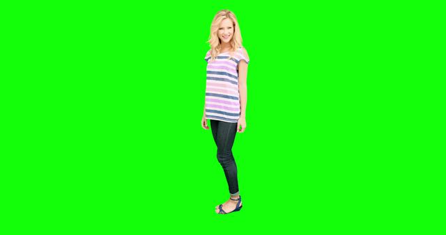 Smiling Woman in Casual Outfit Isolated on Green Background - Download Free Stock Images Pikwizard.com