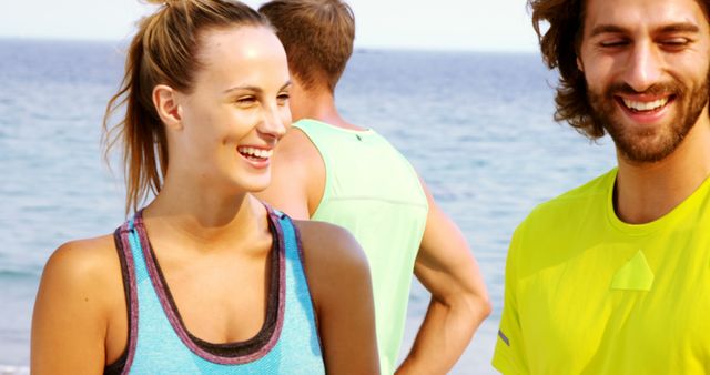 Friends Exercising at Beach in Bright Sportswear - Download Free Stock Images Pikwizard.com