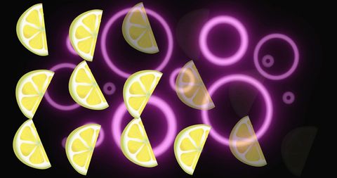 Lemons with glowing purple circles on black background
