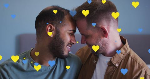 Loving Diverse Couple Celebrating Pride with Yellow and Blue Hearts