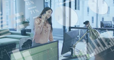 Businesswoman Engaging with Digital Financial Data in Modern Office