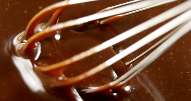 Close-Up of Whisk Mixing Rich Chocolate Sauce - Download Free Stock Images Pikwizard.com